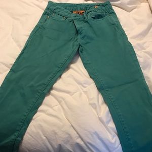 Tory Burch green cropped skinny jeans